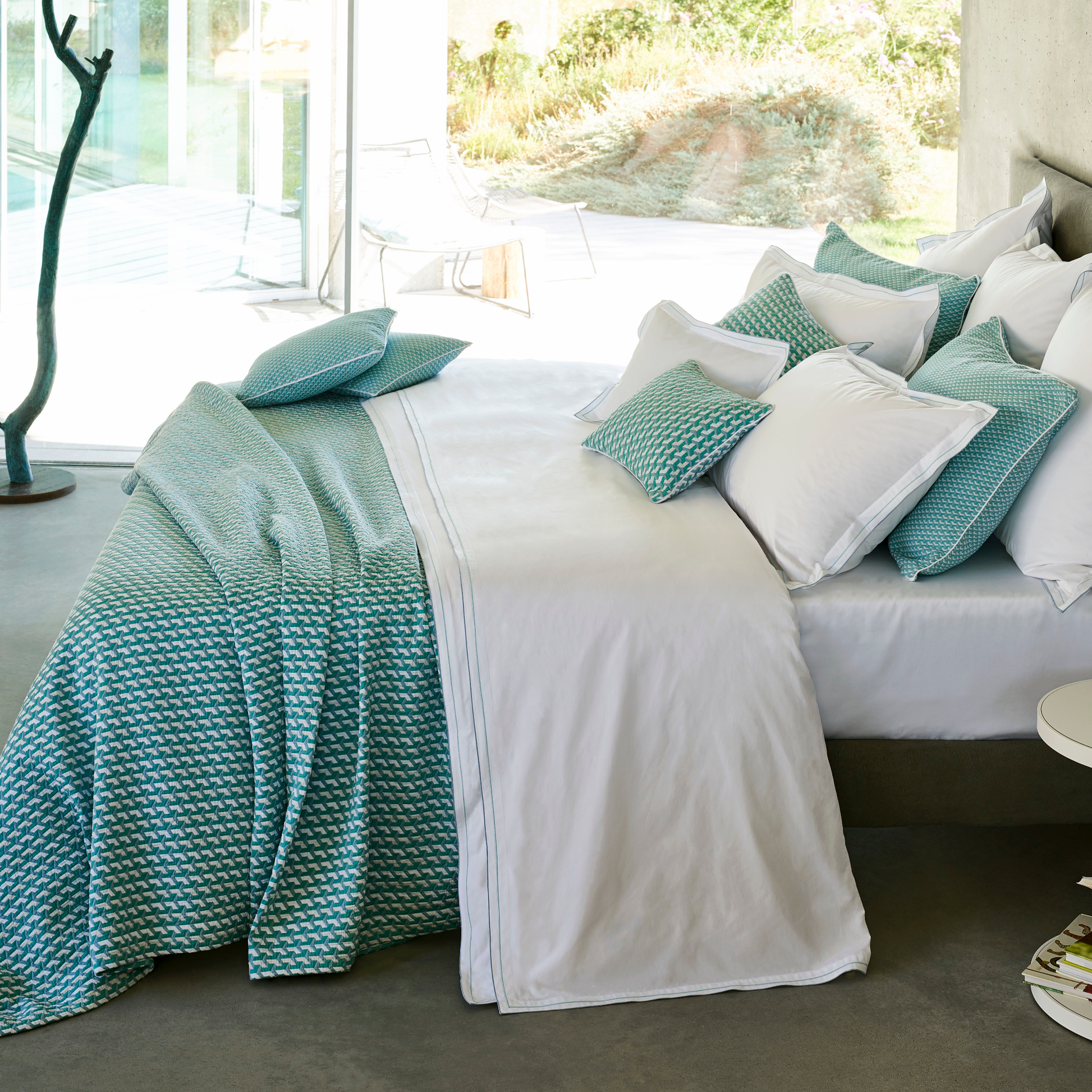 Sideview Lifestyle Shot of Celso de Lemos Tea Collection in Atlantic Color with White Coordinate