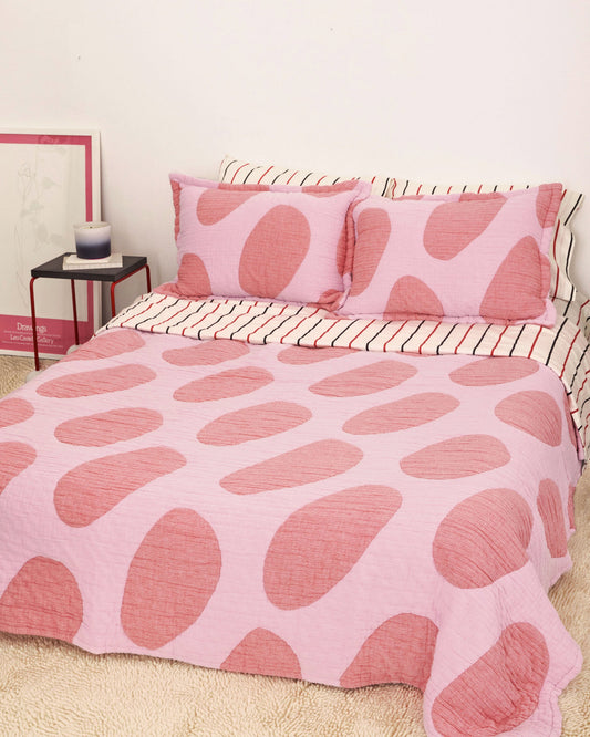 Dusen Dusen Egg Coverlet. Coverlet Set in dark and light pink Egg print. Woven matelassé coverlet with an inner layer of insulation for a quilted effect. Stone-washed, with an extra soft and gauzy hand feel.; Don't put all your eggs in one basket. Because we put them on this blanket!