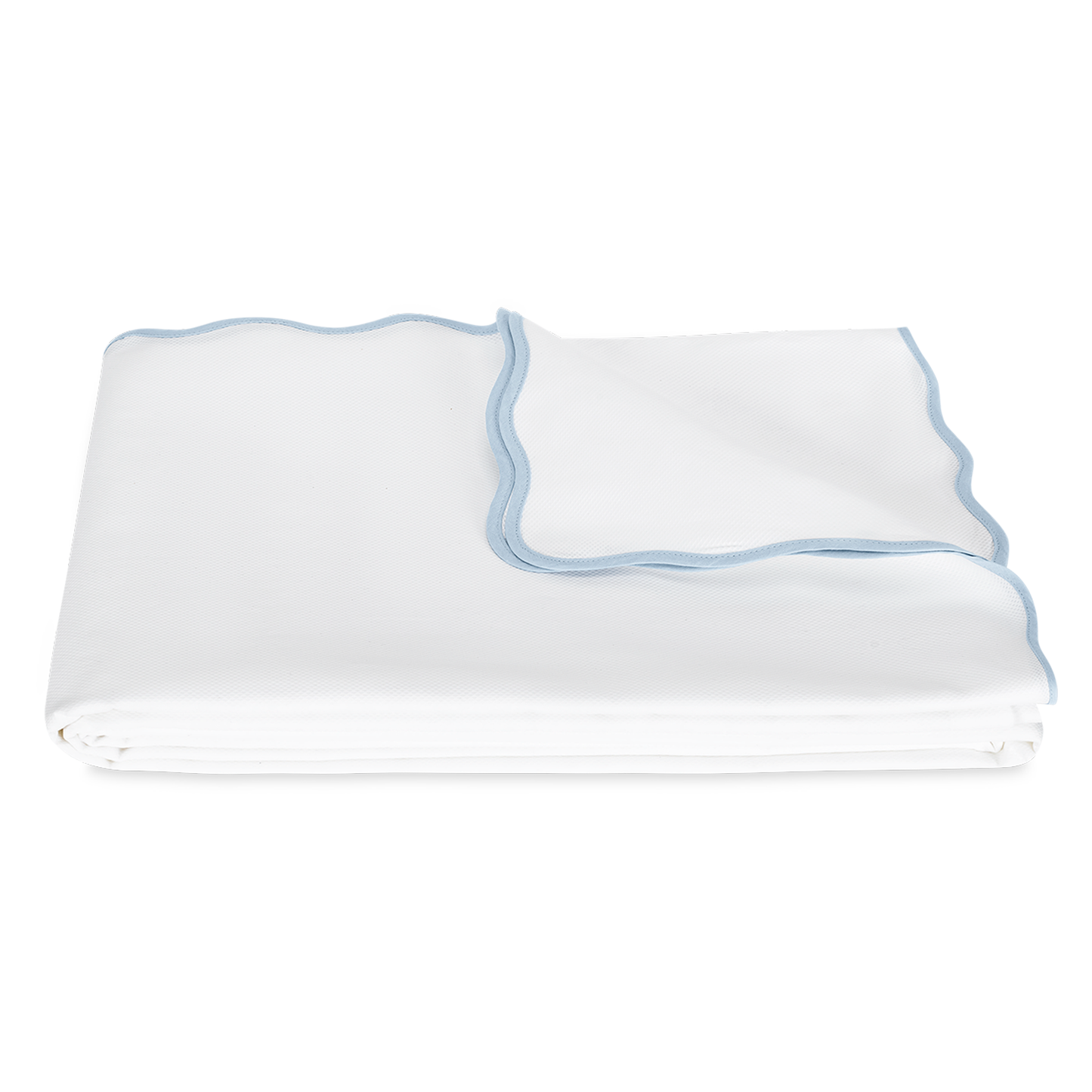 Folded Coverlet of Matouk Camilla Pique Bedding in Color Light Blue