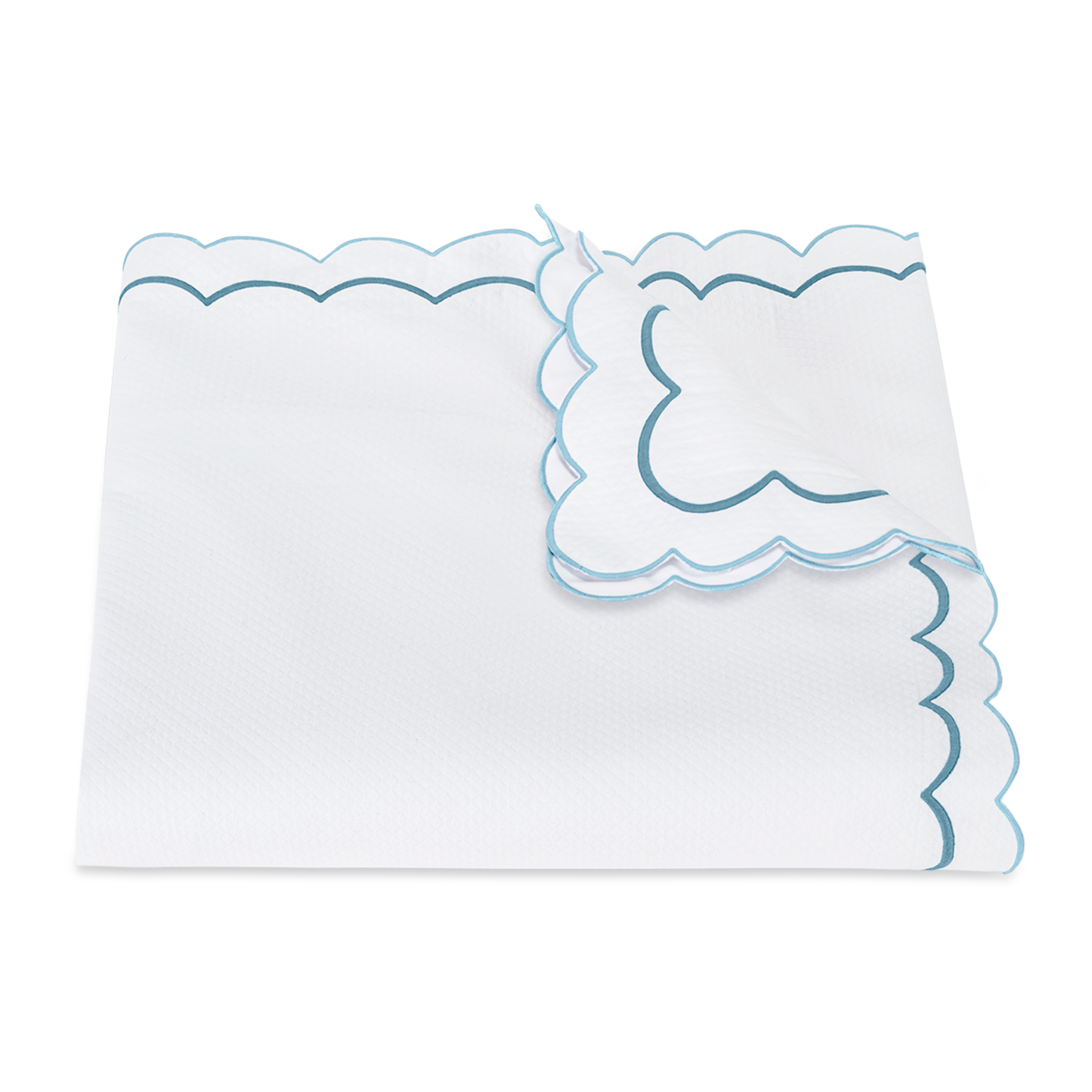 View of a Folded Matouk India Pique Bedding Duvet Cover in Cerulean Color