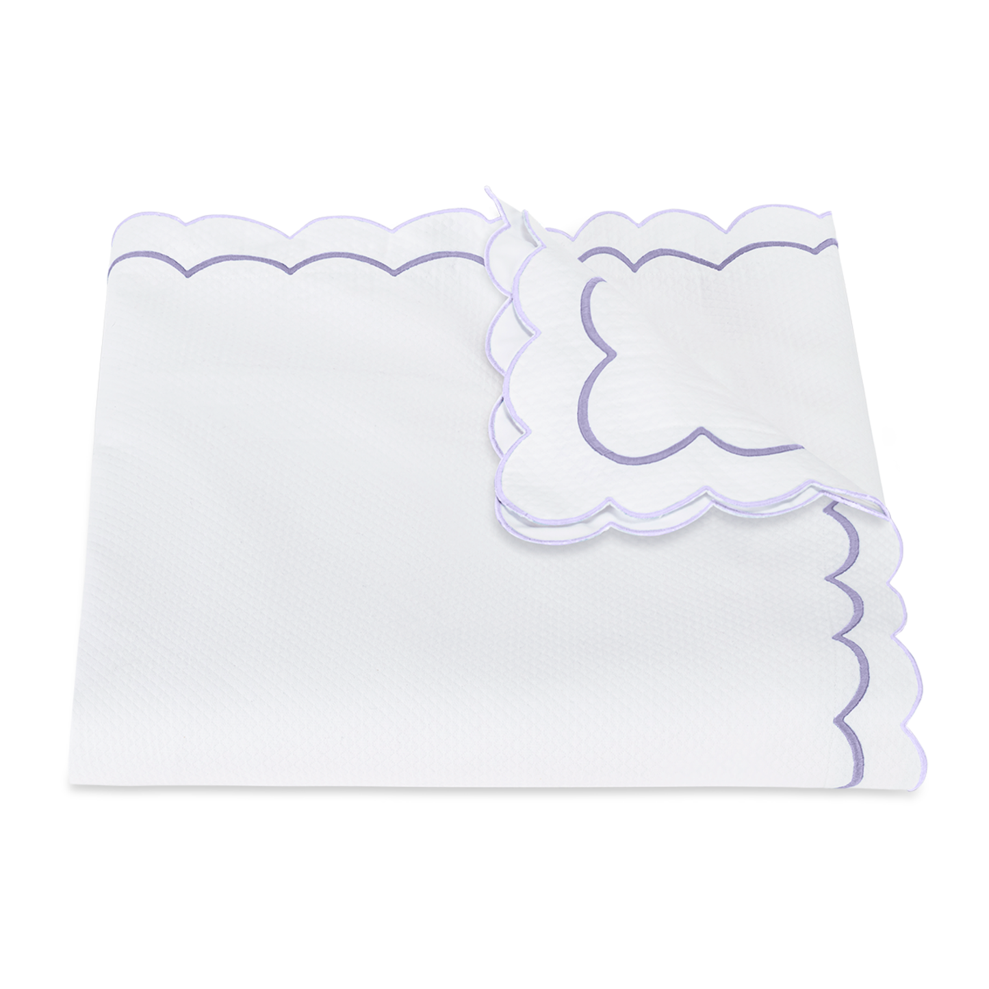View of a Folded Matouk India Pique Bedding Duvet Cover in Lilac Color